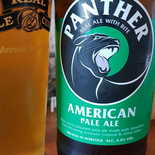 Customer picture of Panther American Pale Ale bottle next to poured glass